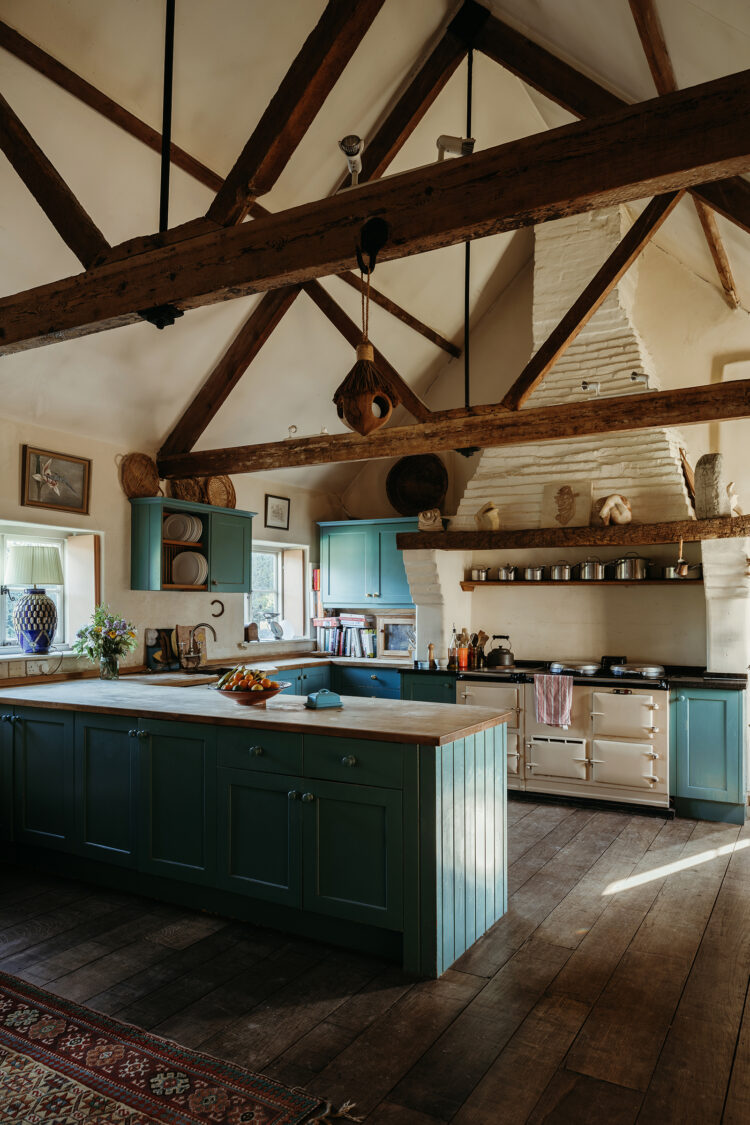 Kitchen with vaulted ceiling and wooden beams