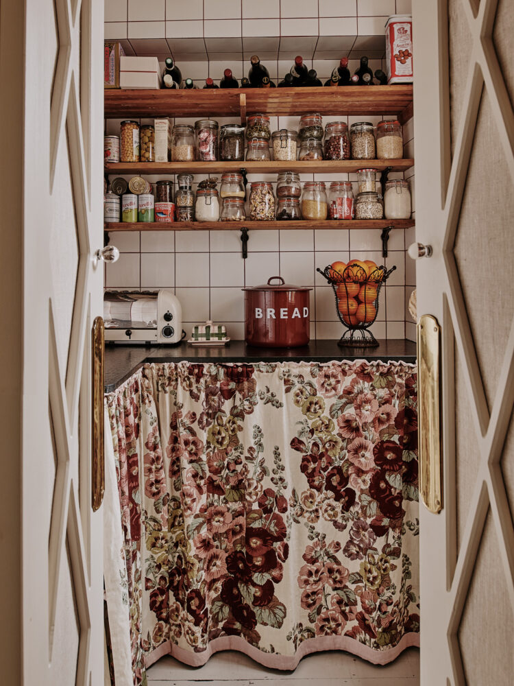 Pantry with floral cupboard skirting
