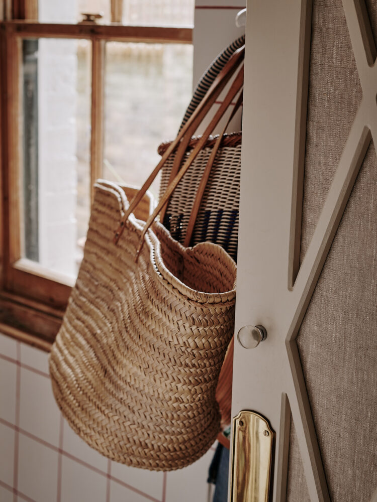 Basket hanging off door handle