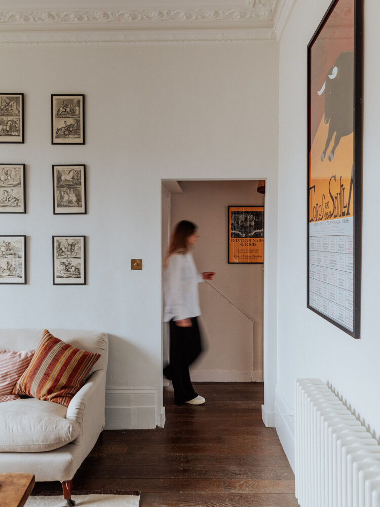 Portrait of Georgie Stogdon inside her apartment on Ospringe Road, north London