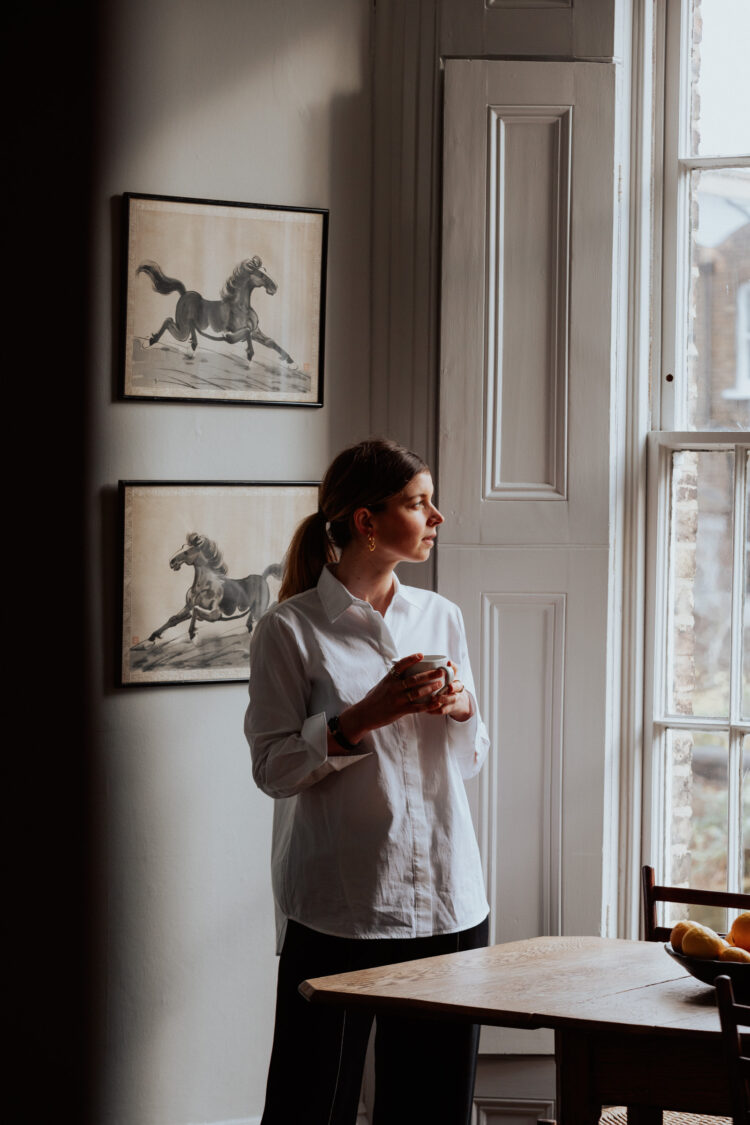 Portrait of Georgie Stogdon inside her apartment on Ospringe Road, north London