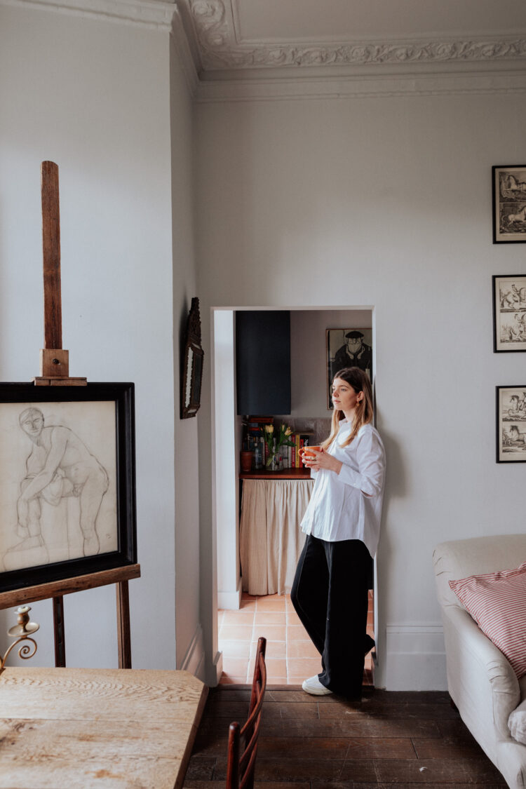 Portrait of Georgie Stogdon inside her apartment on Ospringe Road, north London