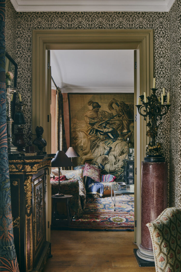 View of sitting room from wallpapered hallway