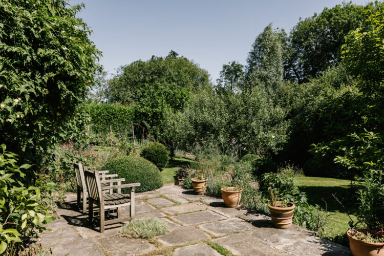 The stone terrace which leads to a wonderful, expansive garden.