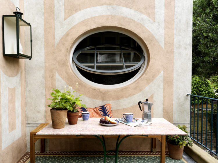 Patio with Circular window and patterned exterior