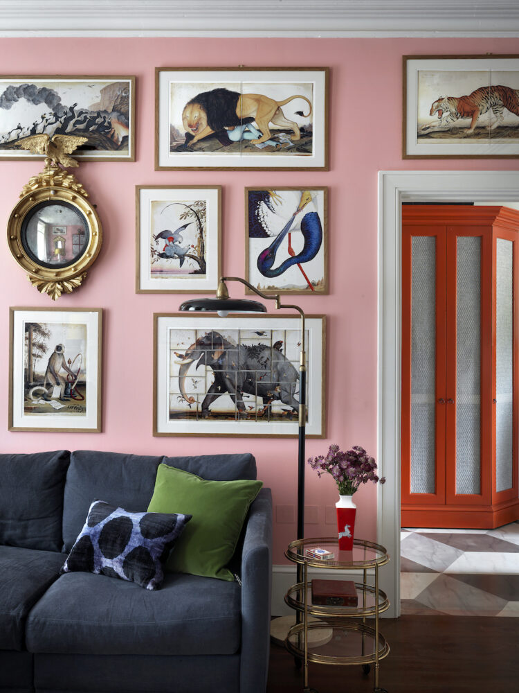 Sitting Room Pink Wall With Framed Prints