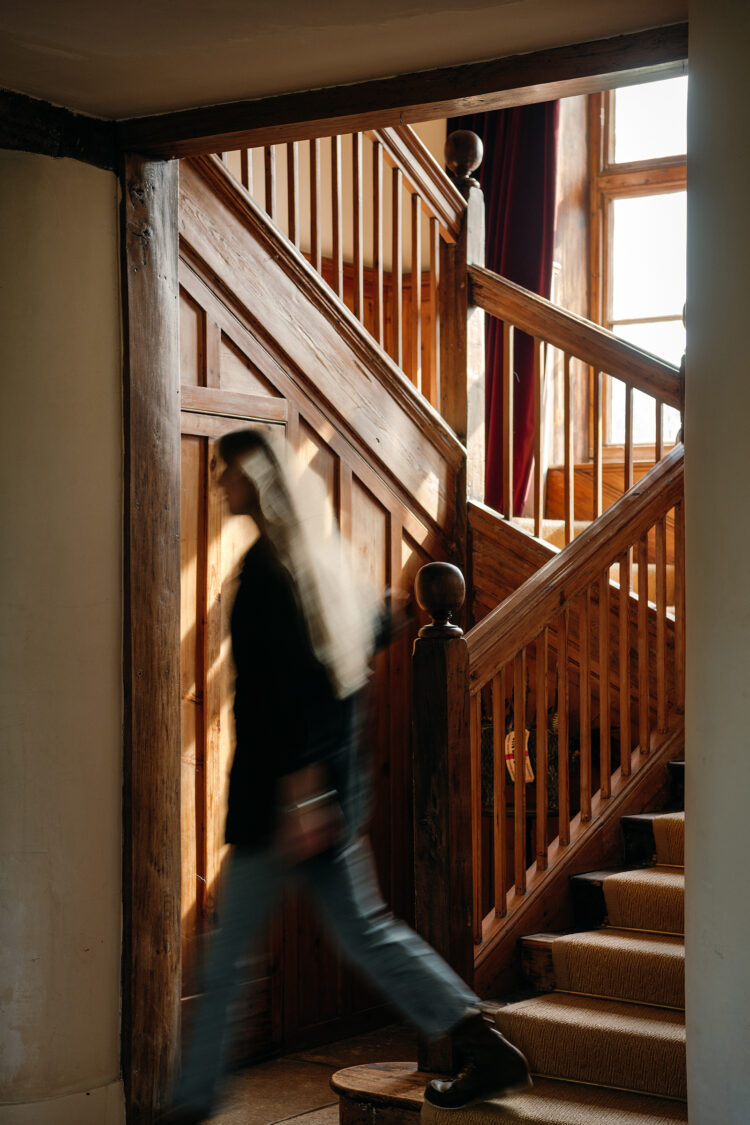 Wooden staircase with wooden panelling