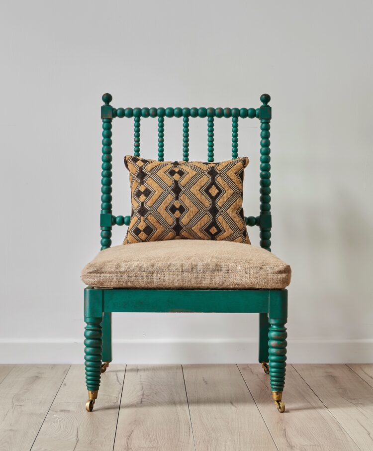 Green faux bamboo chair with upholstered seat