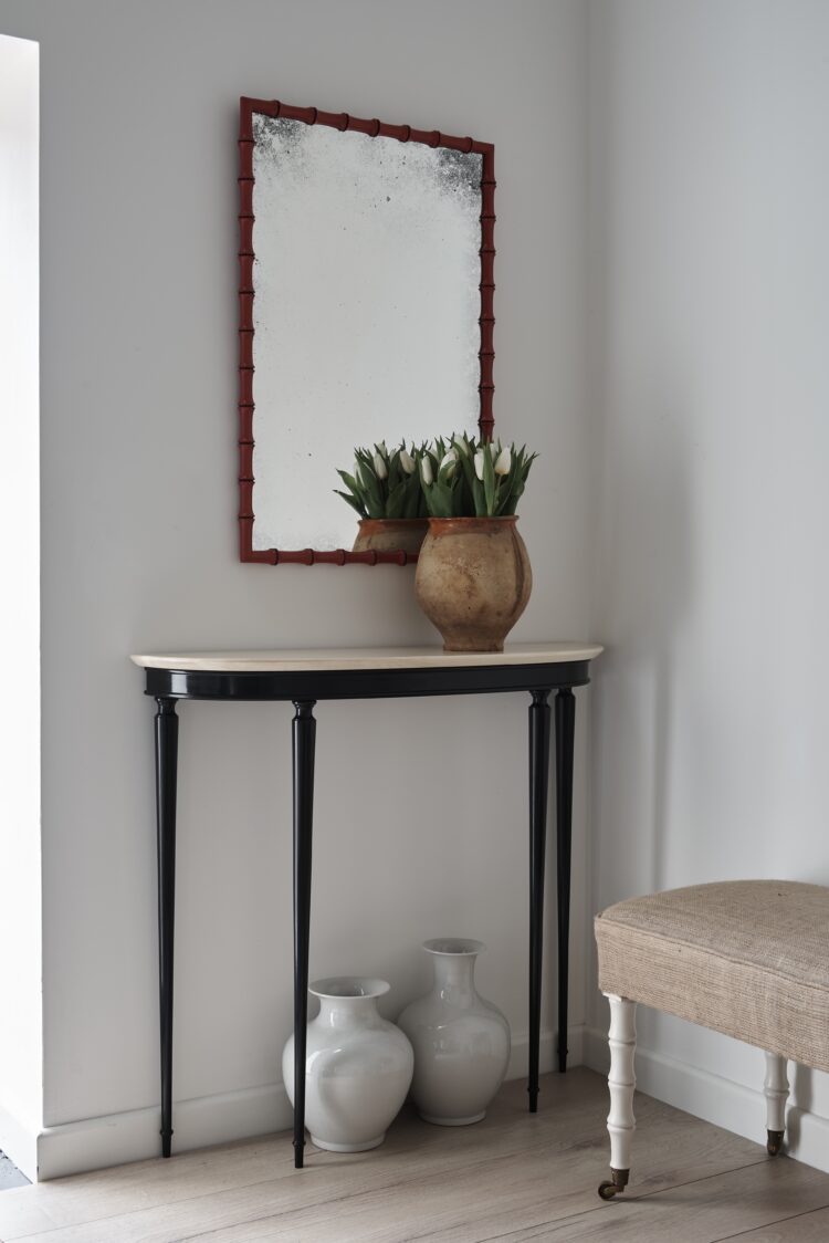 Faux bamboo mirror with side table